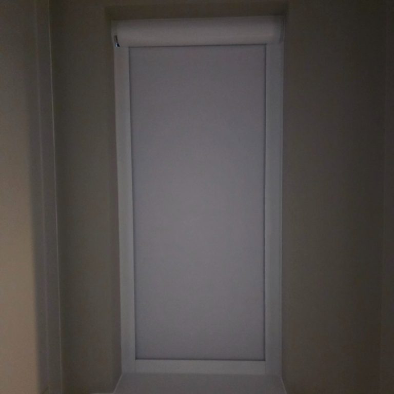Cassette full blackout motorised Louvolite roller blind expertly fitted by TrueShade Interiors