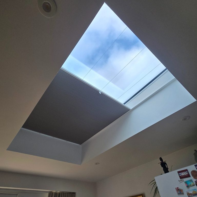 Made to measure skylight blind to tackle heat loss and heat gain installed by TrueShade Interiors