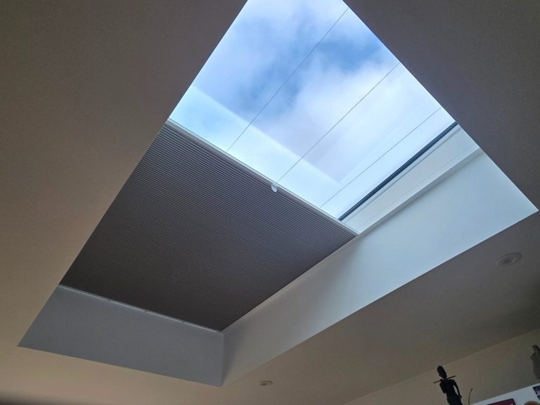 Made to measure roof lantern blind installed to help manage glare, heat and privacy in a glazed extension