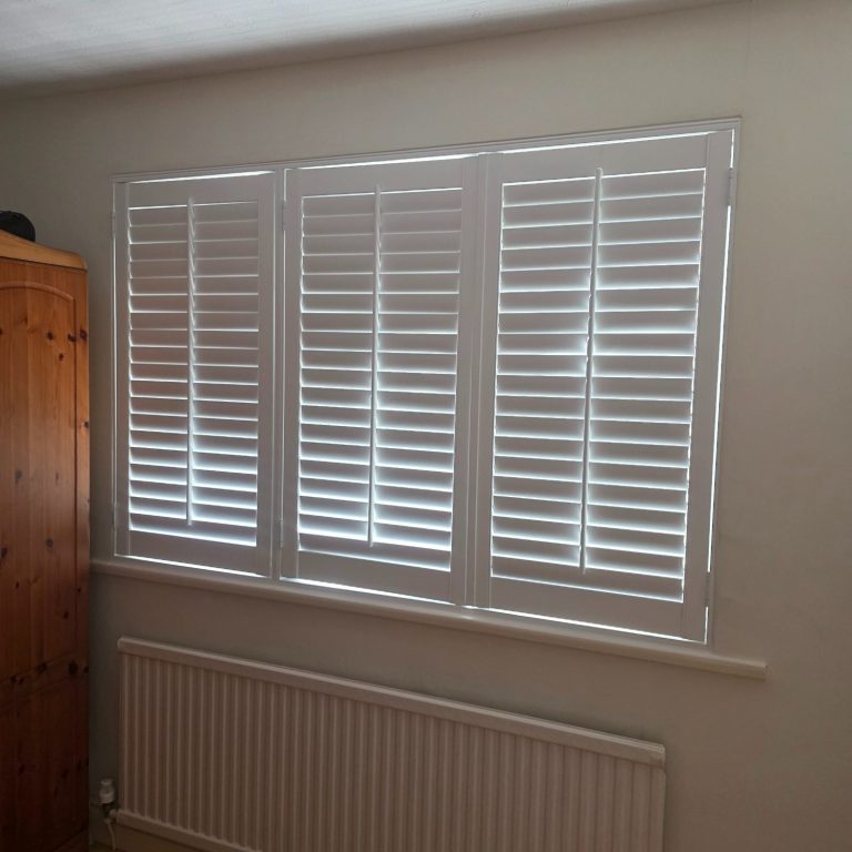 Made to measure full height shutters for extra bedroom comfort measured and installed by TrueShade Interiors