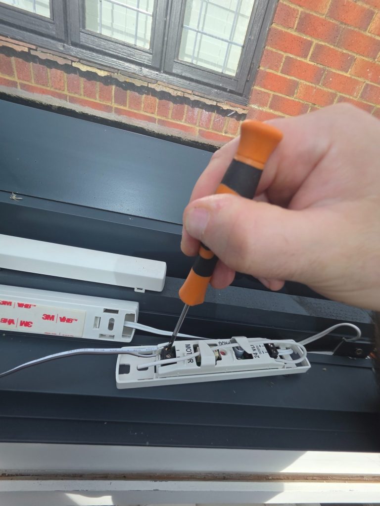 Original external receiver units and wiring from a motorised roof lantern blind, made redundant by replacement motors with built-in receiver