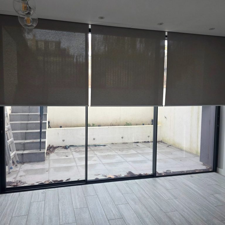 Made to measure smart motorised Somfy roller blinds installed by TrueShade Interiors