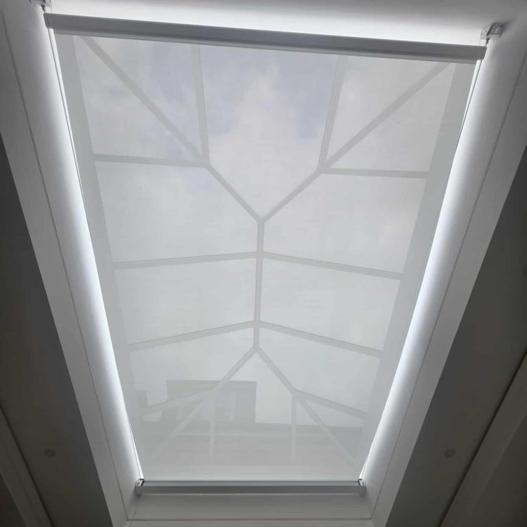 Made to measure motorised dry contact Somfy tensioned roller blinds installed by TrueShade Interiors