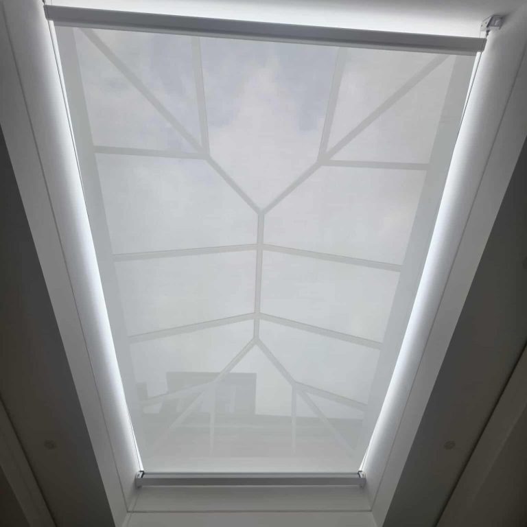 Made to measure motorised dry contact roof lantern blind integrated into AV home system