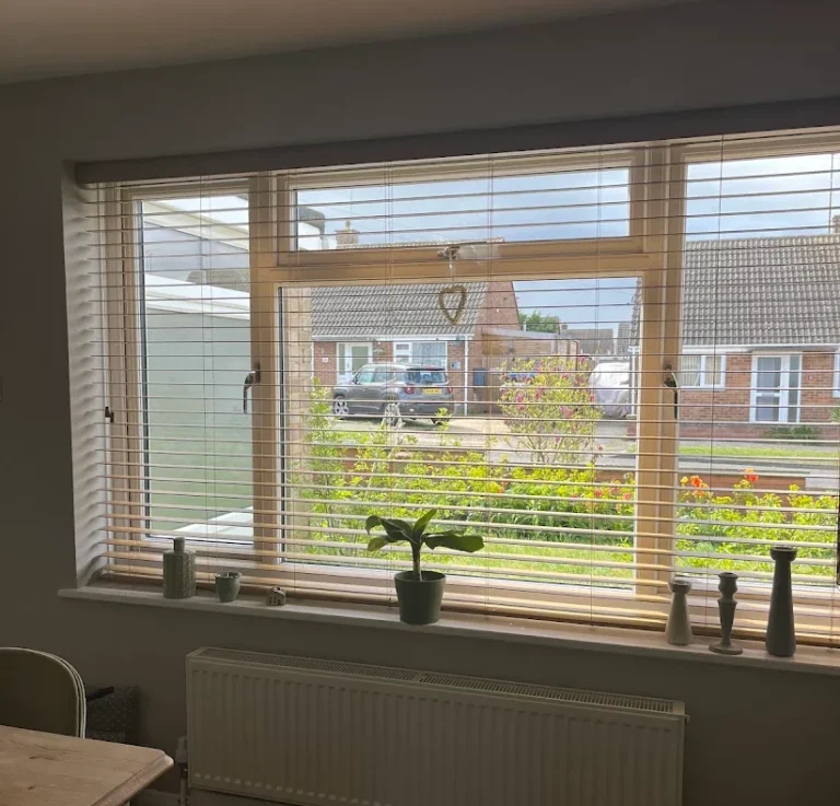 Premium 50mm Fauxwood Venetian blind installed by TrueShade Interiors