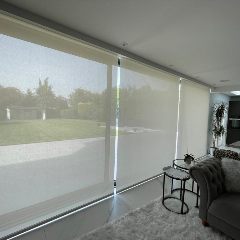 Made to measure smart motorised Lutron roller blinds installed by TrueShade Interiors