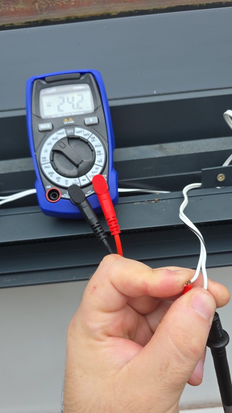 Electrical fault finding on a motorised roof lantern blind, using a digital multimeter to test the wiring and investigatcess for solar blind