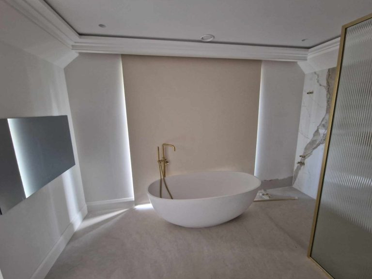 Made to measure roller blind fitted in a modern bathroom for privacy and light control