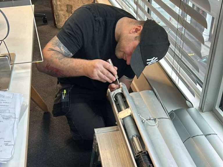 Specialist blind fitting being carried out as part of a commercial or project led installation